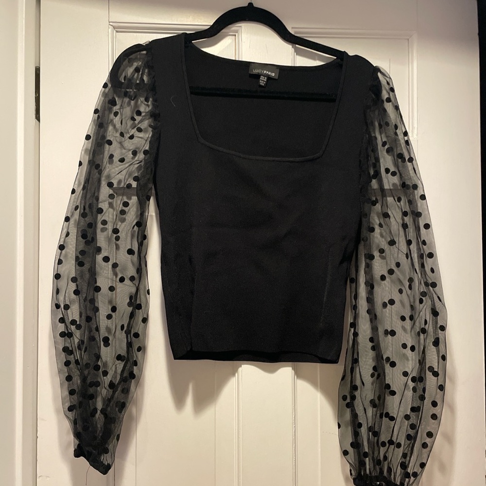 black top with see through sleeves